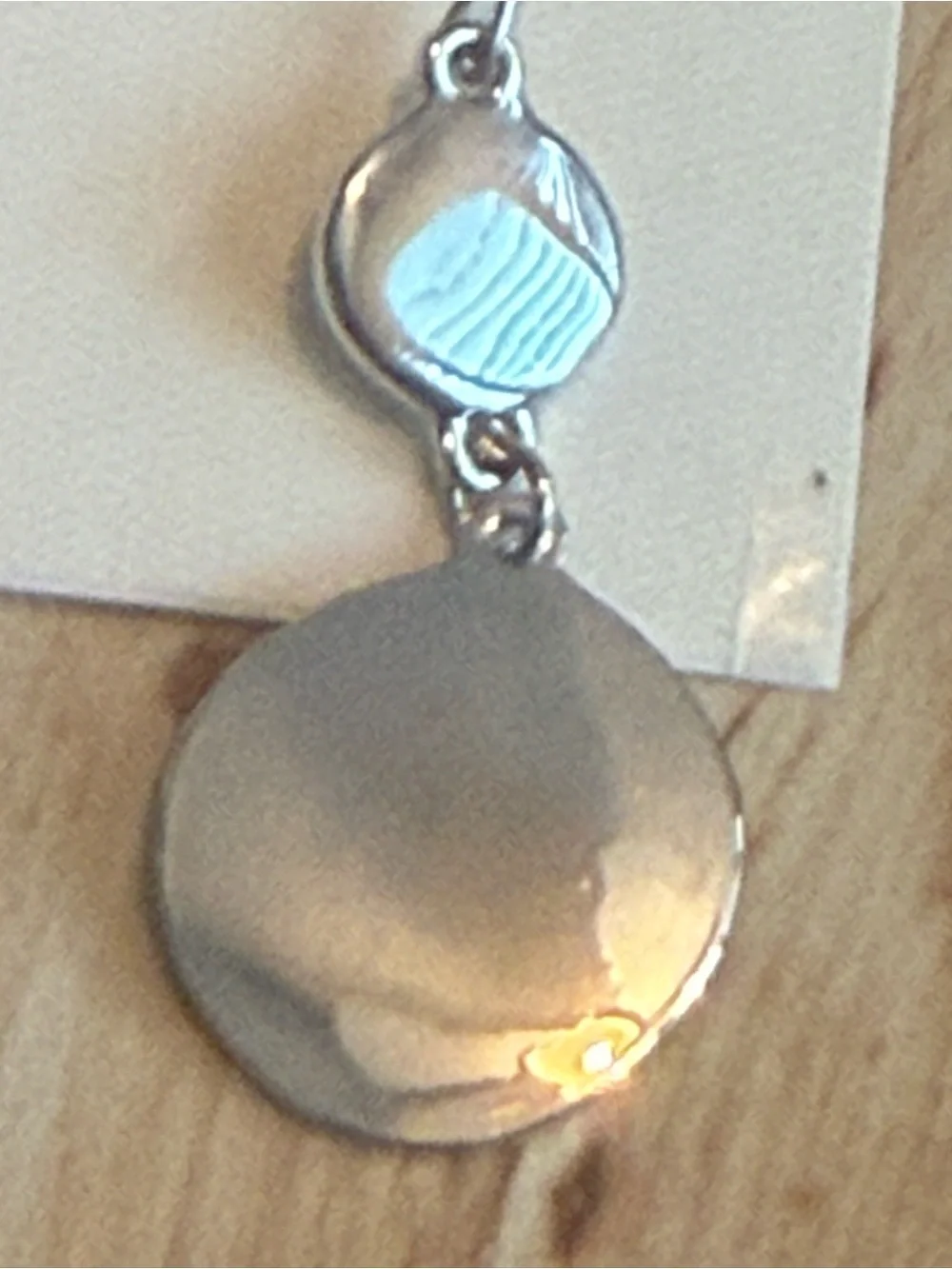NWT. New Directions. Silver Disk Dangle Earring.